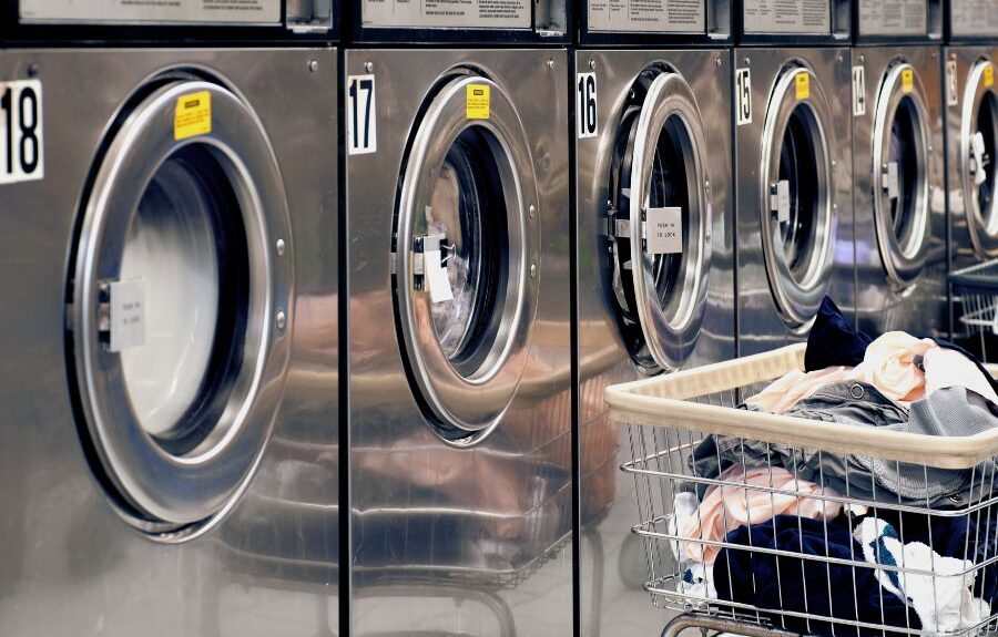 commercial laundry machine with clothes